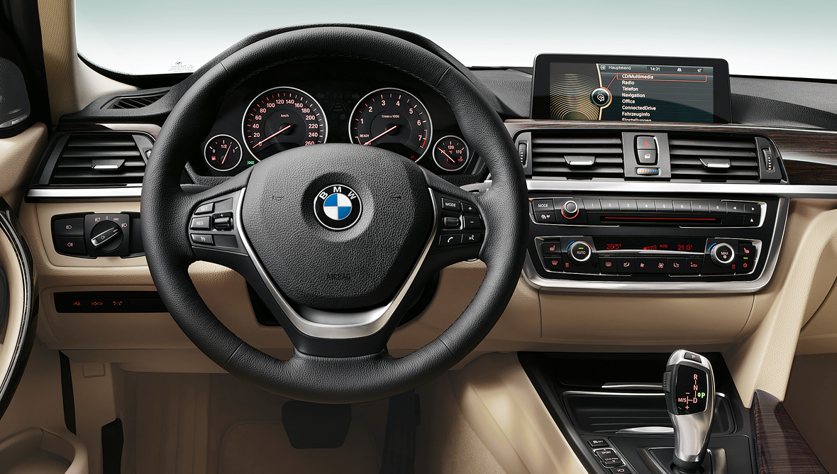 Панель бмв фото BMW leather-covered steering wheel